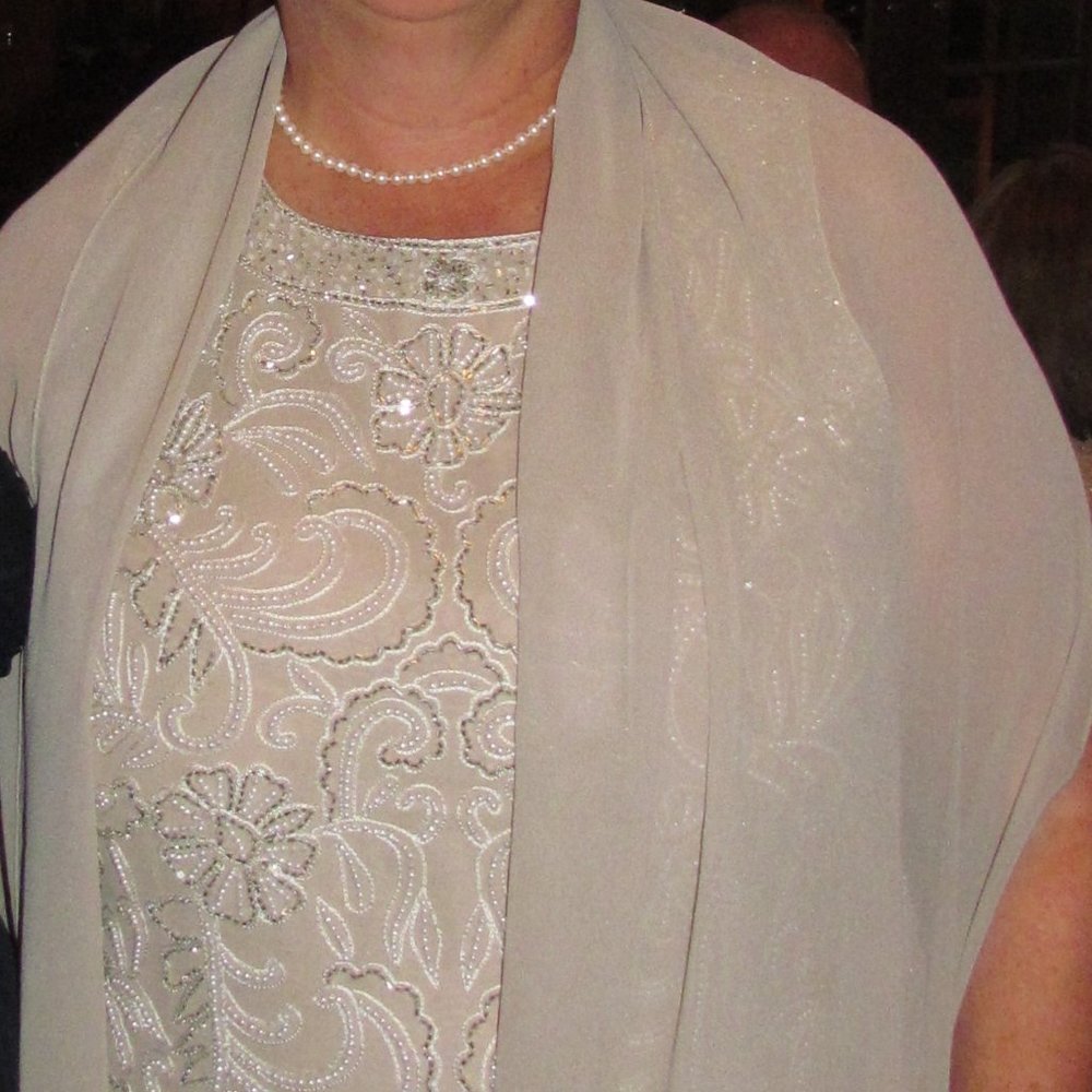 Full length beige dress with beaded top